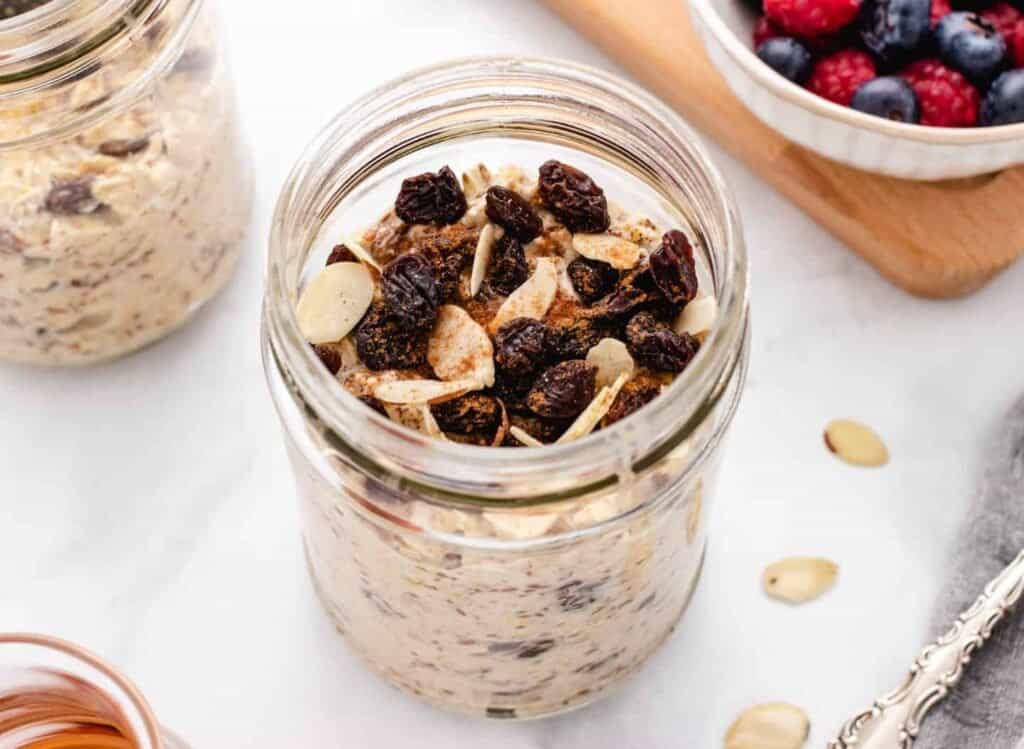 simple overnight oats with raisins in a jar.