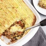 Fluffy mashed potatoes and flavorful filling for a vegan lentil shepherd's pie.