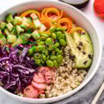 Vegan deconstructed sushi bowl with vegetables in a bowl.