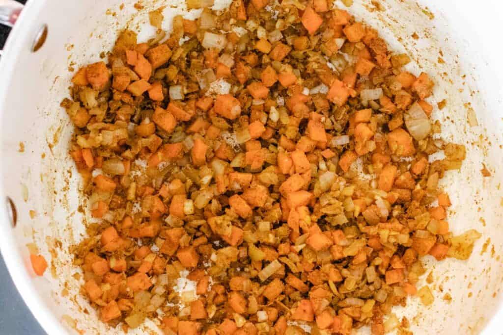 cooked diced carrot and onions with spices