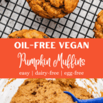 Vegan pumpkin muffins on a cooling rack with chocolate chips.