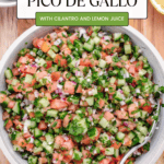 Cucumber pico de gallo in a bowl with a spoon.