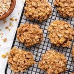 Vegan banana oatmeal cookies on a black cooling rack.